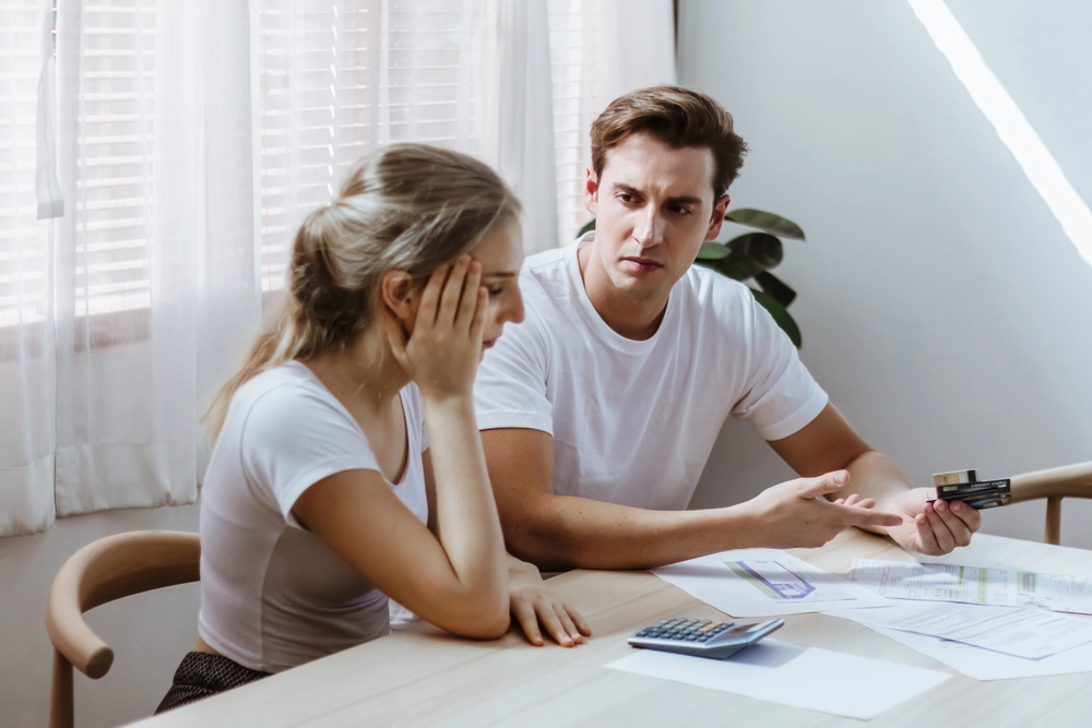 Couple discussing a payday loan in California