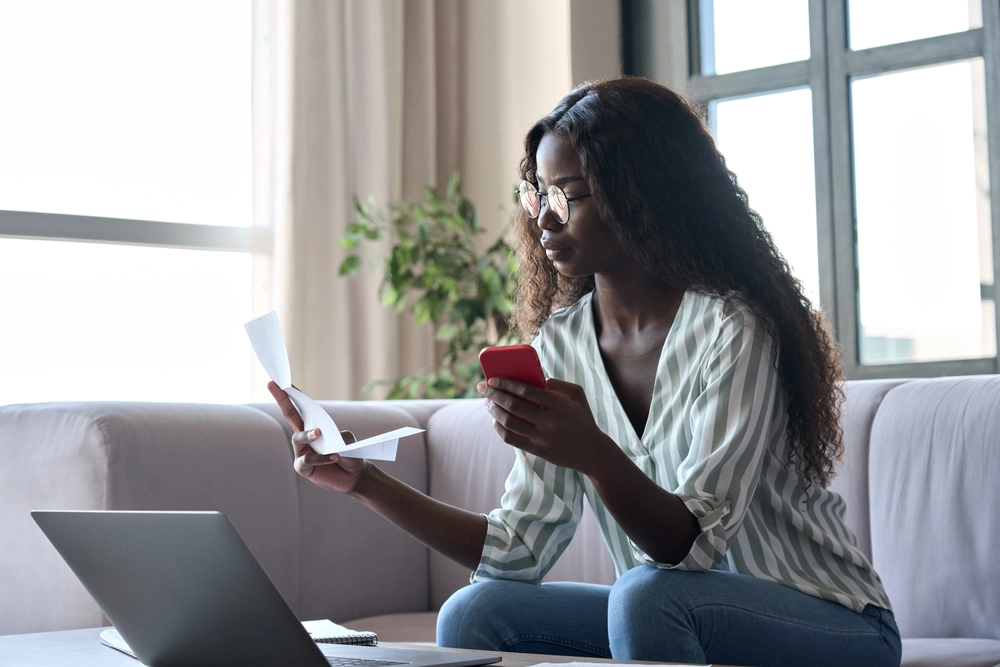 Woman examining different fees