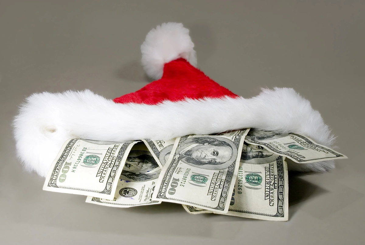 $100 bills in a Santa hat