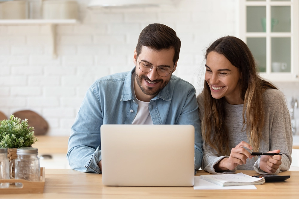 A couple researching what online loan is best for them